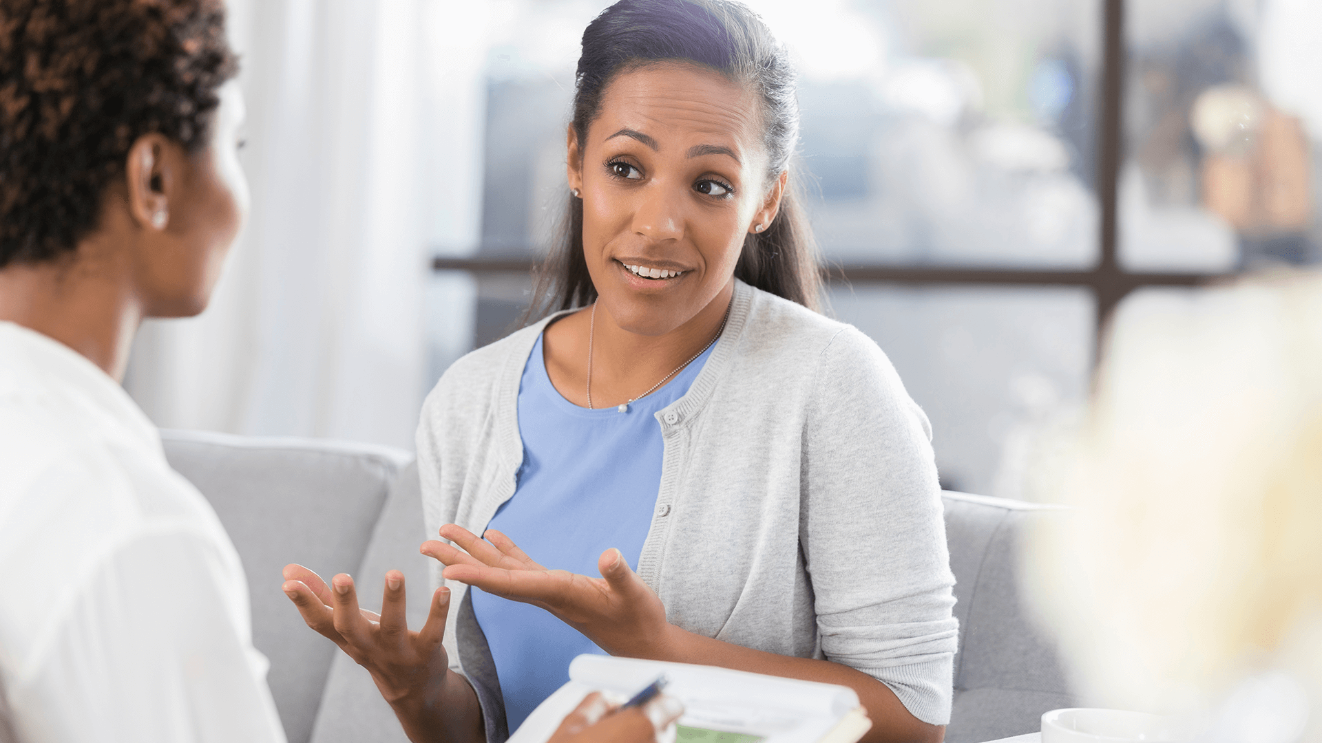 woman speaking with her doctor