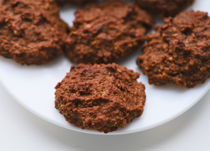 Fudgy cookies on a white plate.