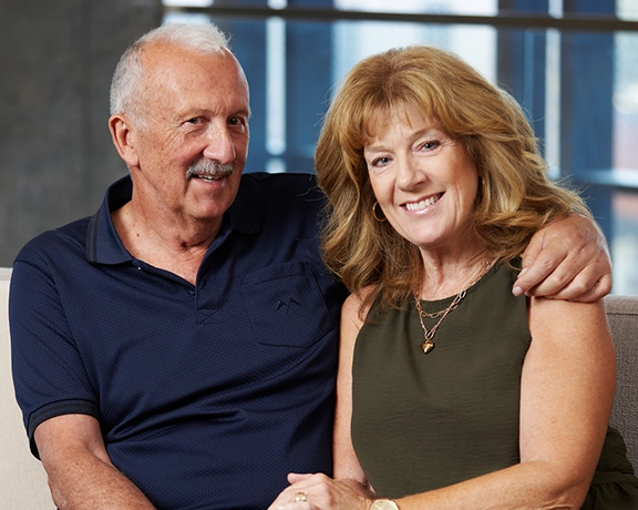 John Vipond, living with stroke, sitting with his wife Barb